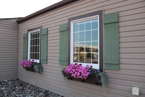 Beautiful pink flowers in window boxes on a building in Sugarcreek, Ohio.
